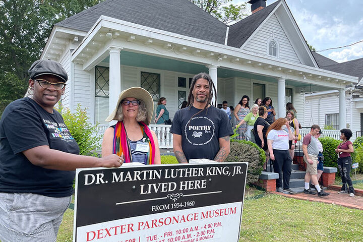 Freedom summer class stands outside MLK home.
